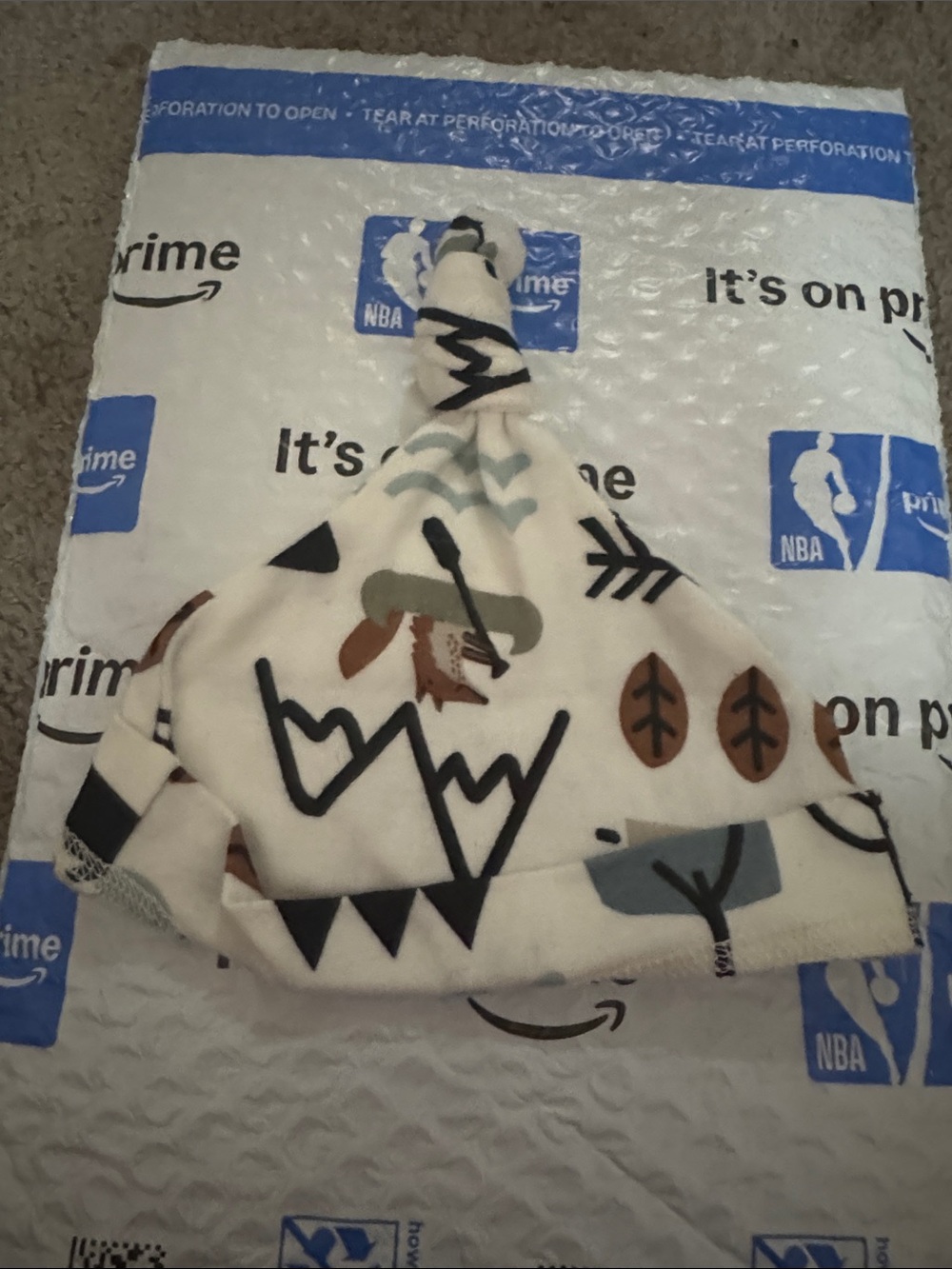 Gerber Cream Baby Knot Hat with Brown, Black and Blue Print